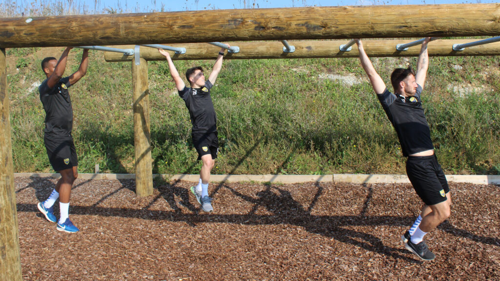 People on a set of monkey bars