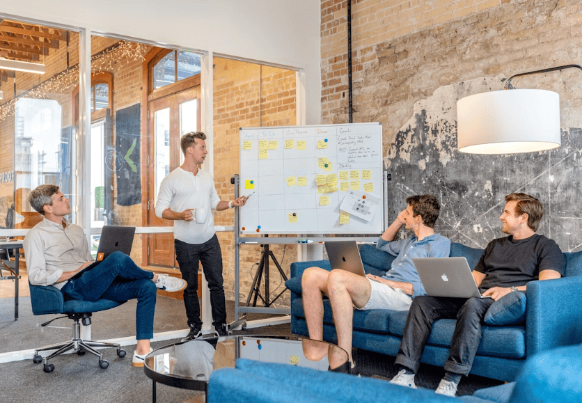 employees planning and chatting together at work