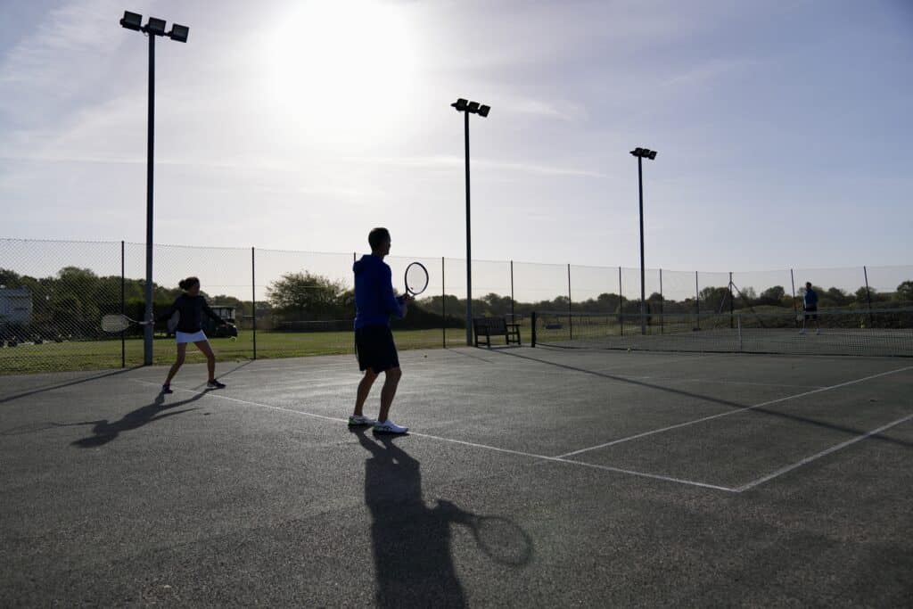 Tennis players playing on tennis court